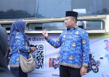 ASN Asahan Kini Bisa Bayar Pajak Kendaraan Saat Upacara HKN