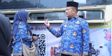 ASN Asahan Kini Bisa Bayar Pajak Kendaraan Saat Upacara HKN